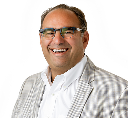 A headshot of Alan Lazowski, Chairman, CEO, and Founder of LAZ Parking.