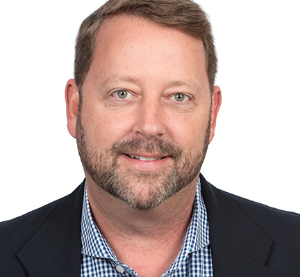 A headshot of Christopher Walsh, Regional Vice President, Florida at LAZ Parking.