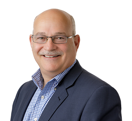 A headshot of Mark Lutwack, Managing Partner at LAZ Parking.