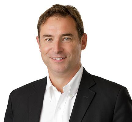 A headshot of Nathan Owen, Chief Financial Officer at LAZ Parking.