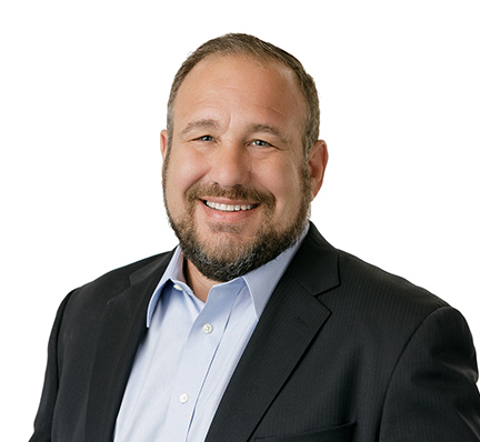 A headshot of Tony Mele, Vice President of Information Technology at LAZ Parking.