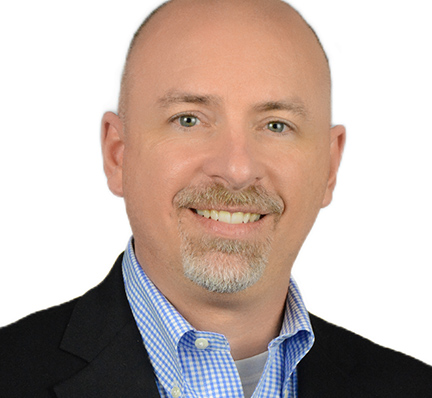 A headshot of Tom Williams, Head of Accounting at LAZ Parking.